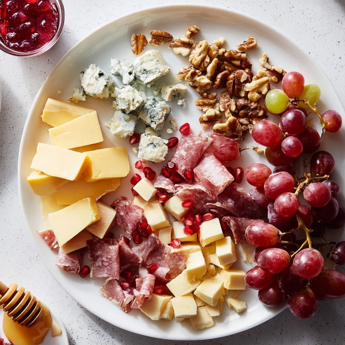 A beautiful overhead shot of a Christmas 2025 Festive Grazing Board, ready to serve with crackers and honey.