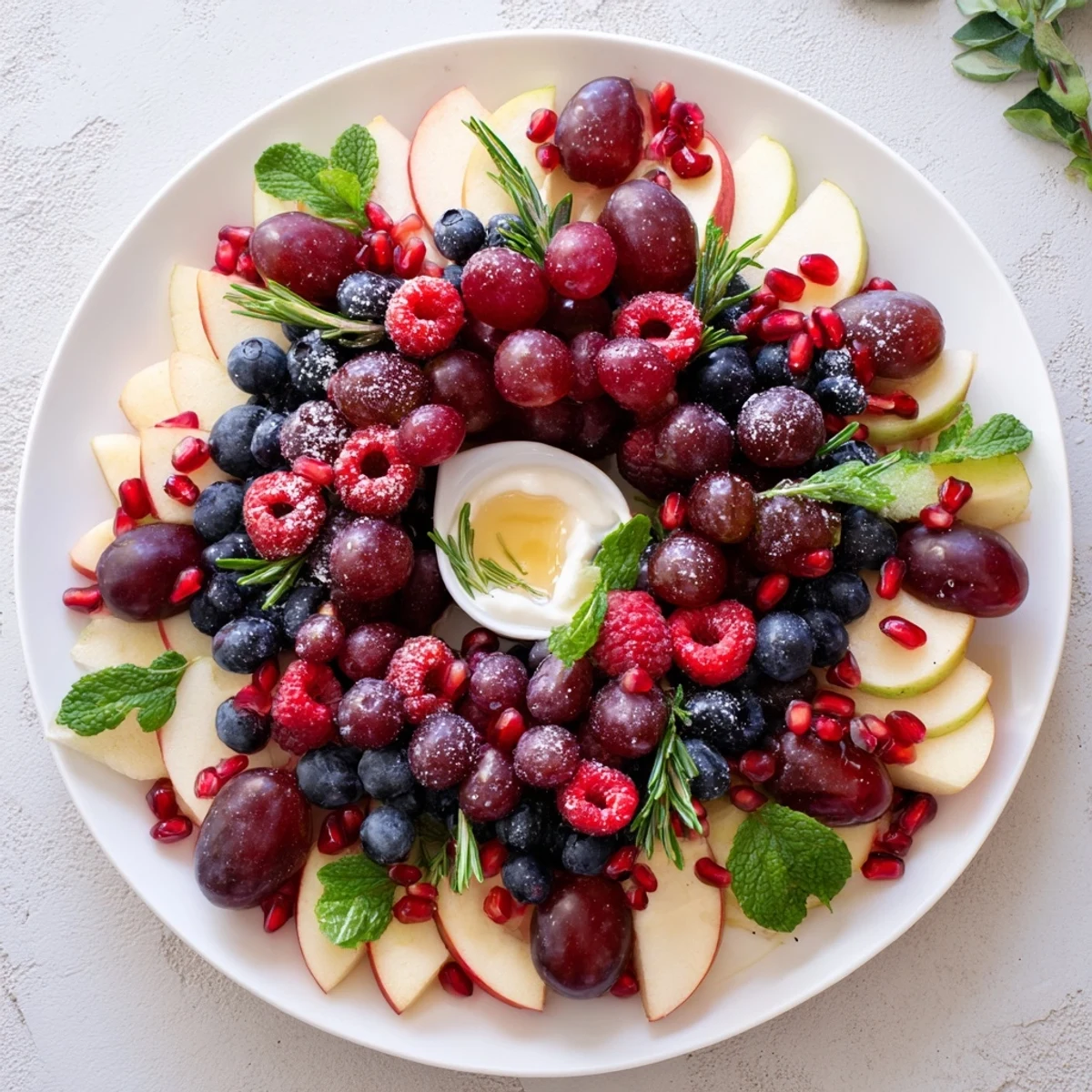 Vibrant Winter Berry Wreath Fruit Board arrangement, showcasing fresh berries and fruit for a festive appetizer.