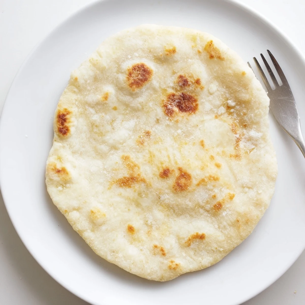 Warm, golden cottage cheese flatbread, perfect for dipping, freshly pan-fried and ready to enjoy.
