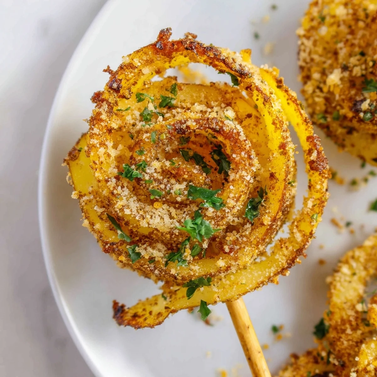 Crispy golden Tornado Potatoes, perfectly seasoned, ready to enjoy as a flavorful snack or side dish.