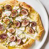Close-up of a warm, bubbly puff pastry truffle pizza, ready for a gourmet appetizer.