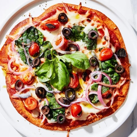 Golden-brown Crispy Tortilla Pizza, fresh from the oven, with melted cheese and vibrant toppings.